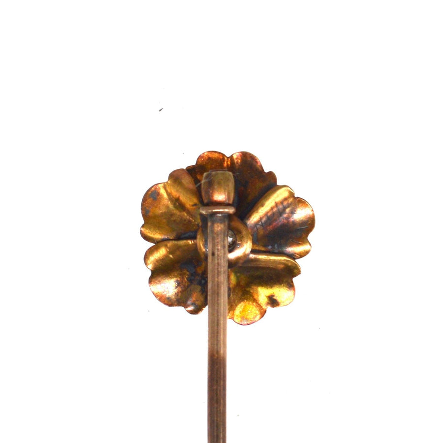 Art Nouveau 9ct gold flower tie pin featuring intricate floral design and vintage charm.