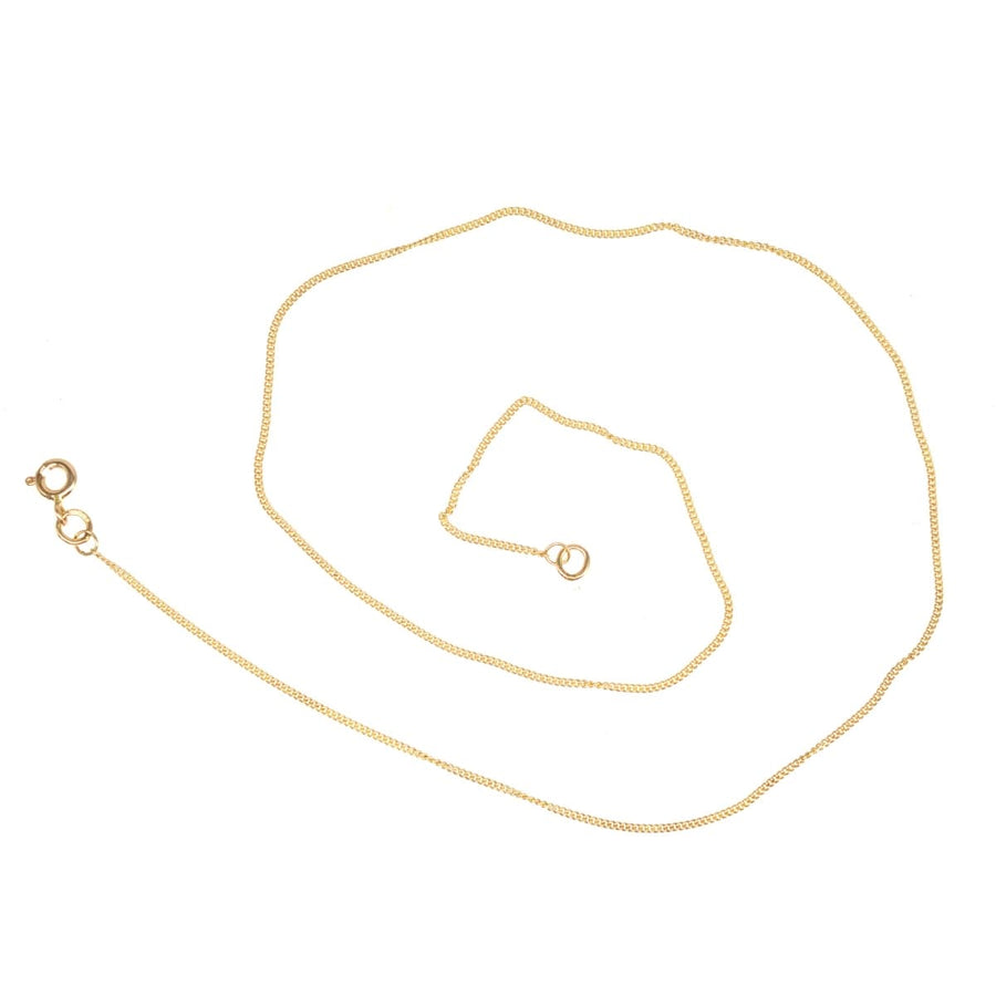 Polished 9ct gold curb chain measuring 16 inches with a width of 1.1 mm, showcasing British craftsmanship.