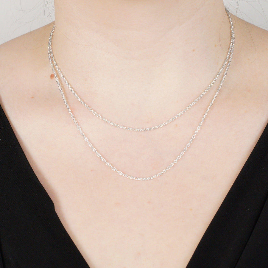 Contemporary silver Prince of Wales rope chain worn, showcasing its fine polished design and classic style.