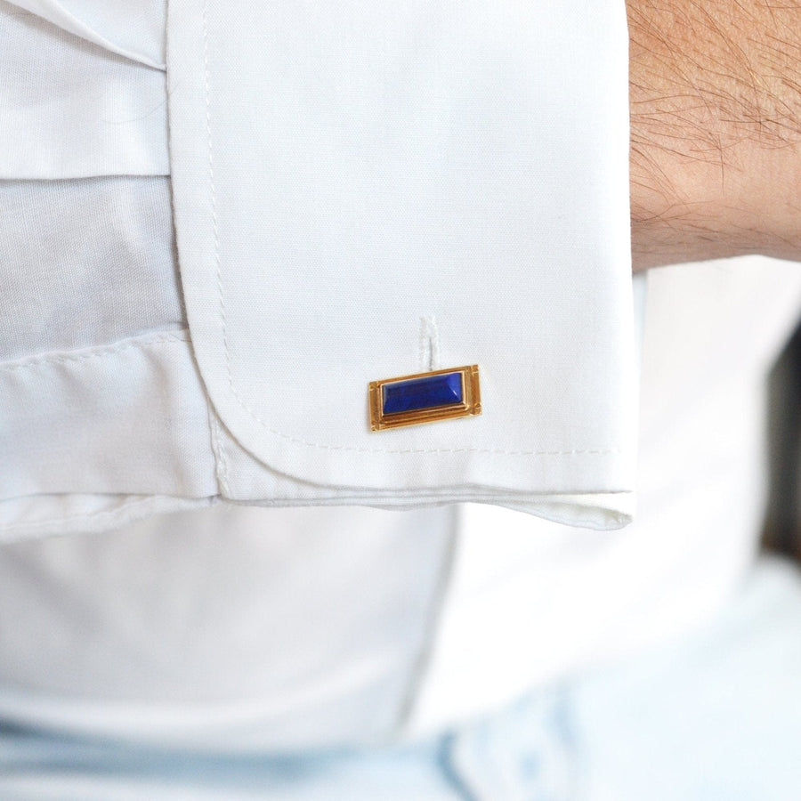 Danish vintage 14ct gold cufflinks with blue lapis lazuli detail on white shirt cuff.