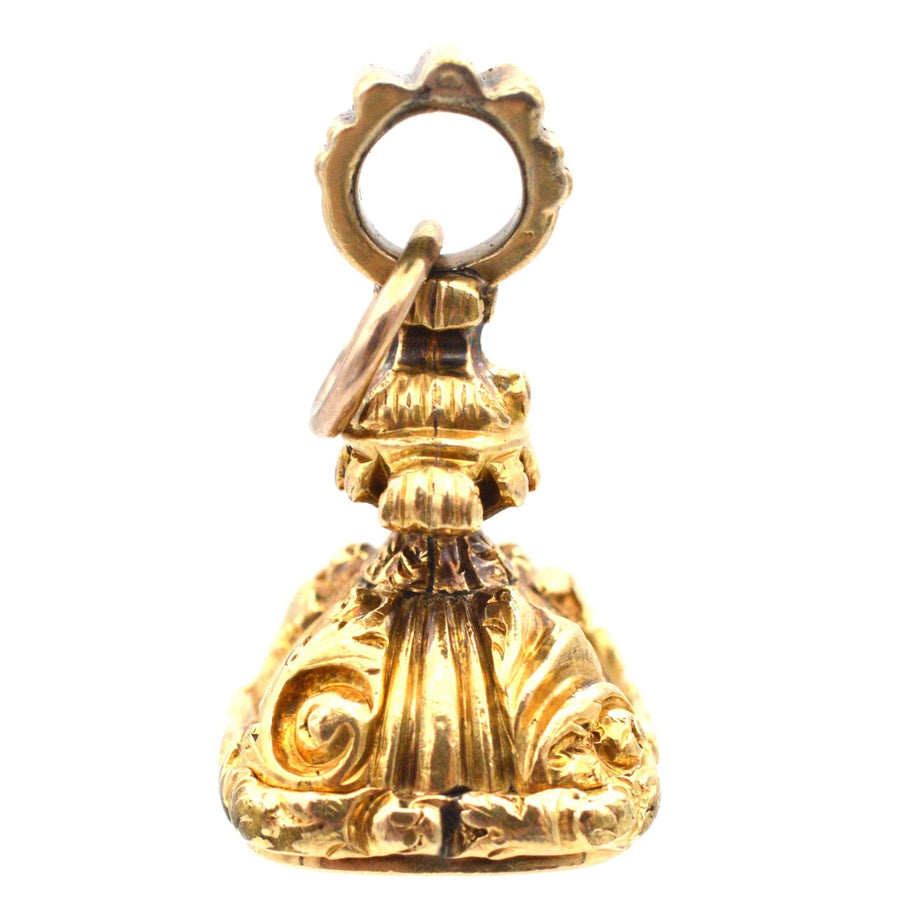Decorative 18ct gold cased chalcedony seal featuring the engraved name Louisa, crafted in the 1800s.