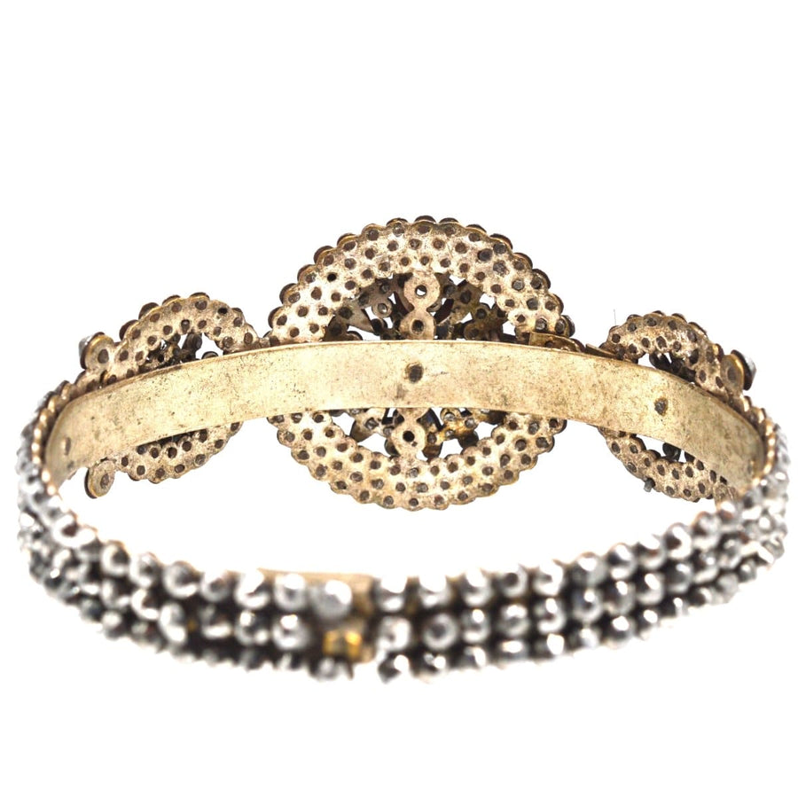 Regency cut steel bangle showcasing intricate design and vintage charm, reminiscent of 19th-century elegance.