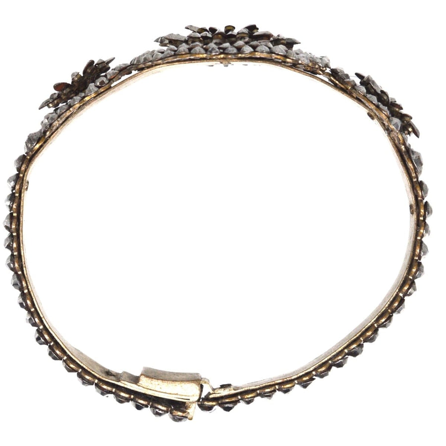 Early 19th Century Cut Steel Bangle, featuring intricate riveted steel studs that mimic rose cut diamonds.