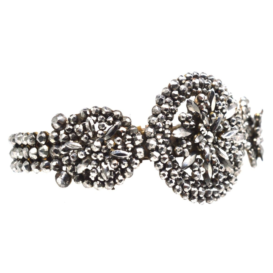 Early 19th Century cut steel bangle showcasing intricate design and sparkling polished steel accents.