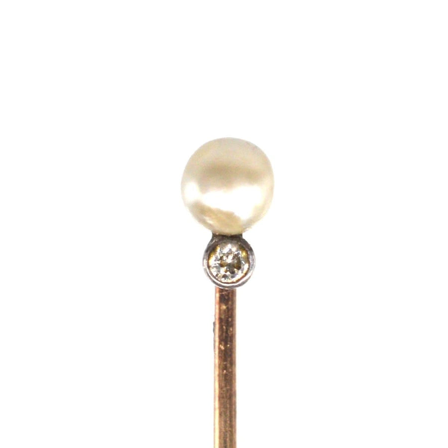 Elegant Edwardian 14ct gold tie pin featuring a lustrous natural pearl and sparkling diamond, ideal for silk ties.