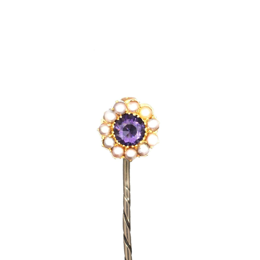 Edwardian 15ct gold stickpin featuring a cluster of amethyst and pearl, showcasing exquisite craftsmanship.