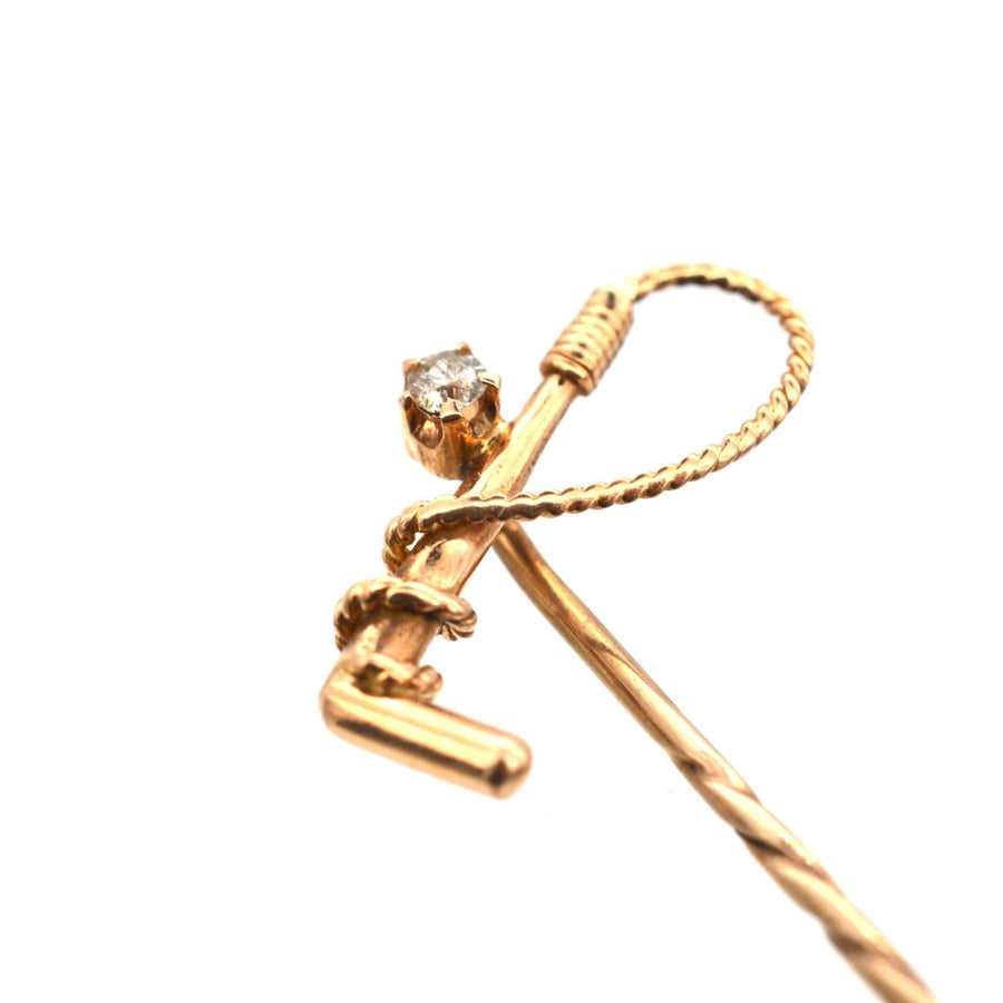 Edwardian 15ct gold and diamond hunting crop tie pin, circa 1900, perfect for hunting and riding enthusiasts.