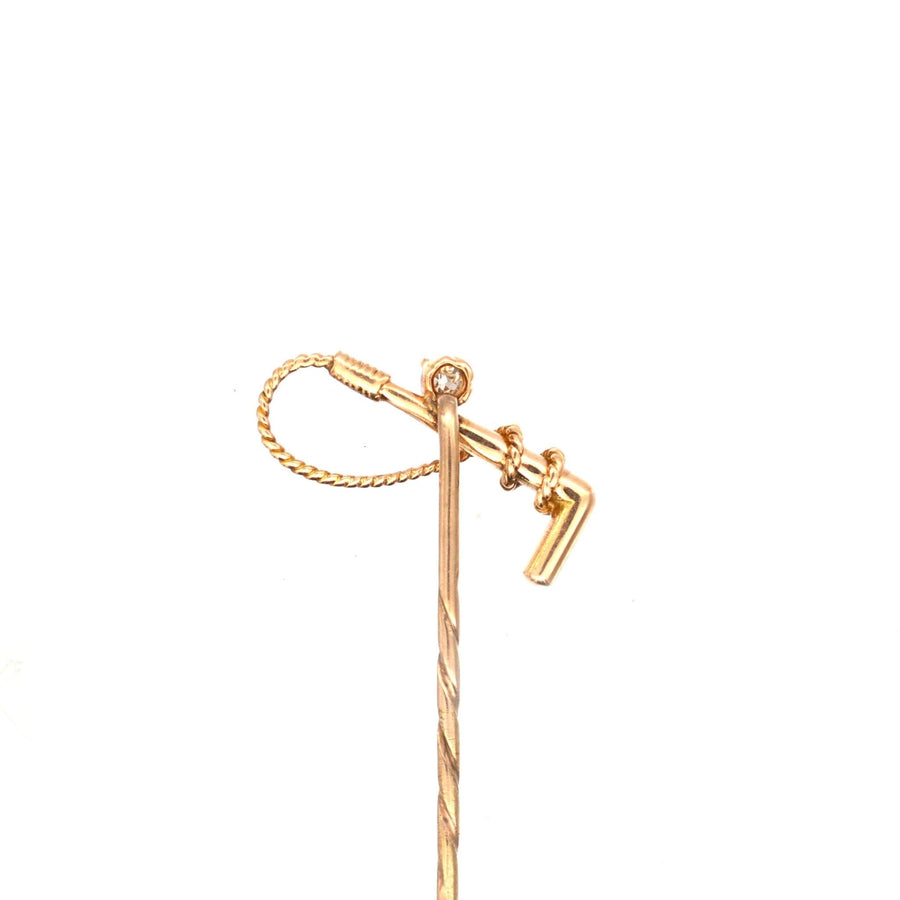 Edwardian 15ct gold and diamond hunting crop tie pin, vintage accessory for hunting or riding enthusiasts.