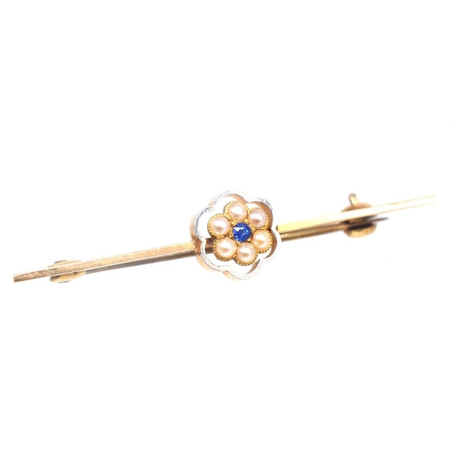 Edwardian 15ct gold and platinum bar brooch with sapphire and pearl flower, vintage jewelry from circa 1910-1920s.