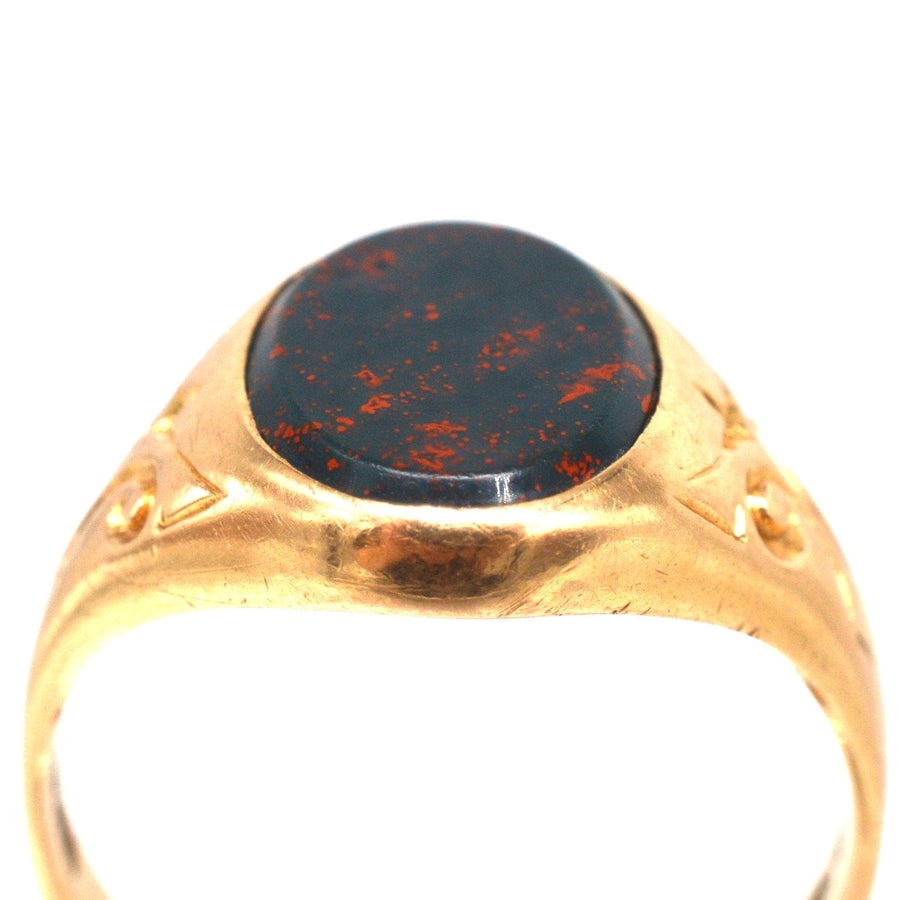 Edwardian 15ct gold bloodstone signet ring with intricate detailing, perfect for engraving or as a statement piece.