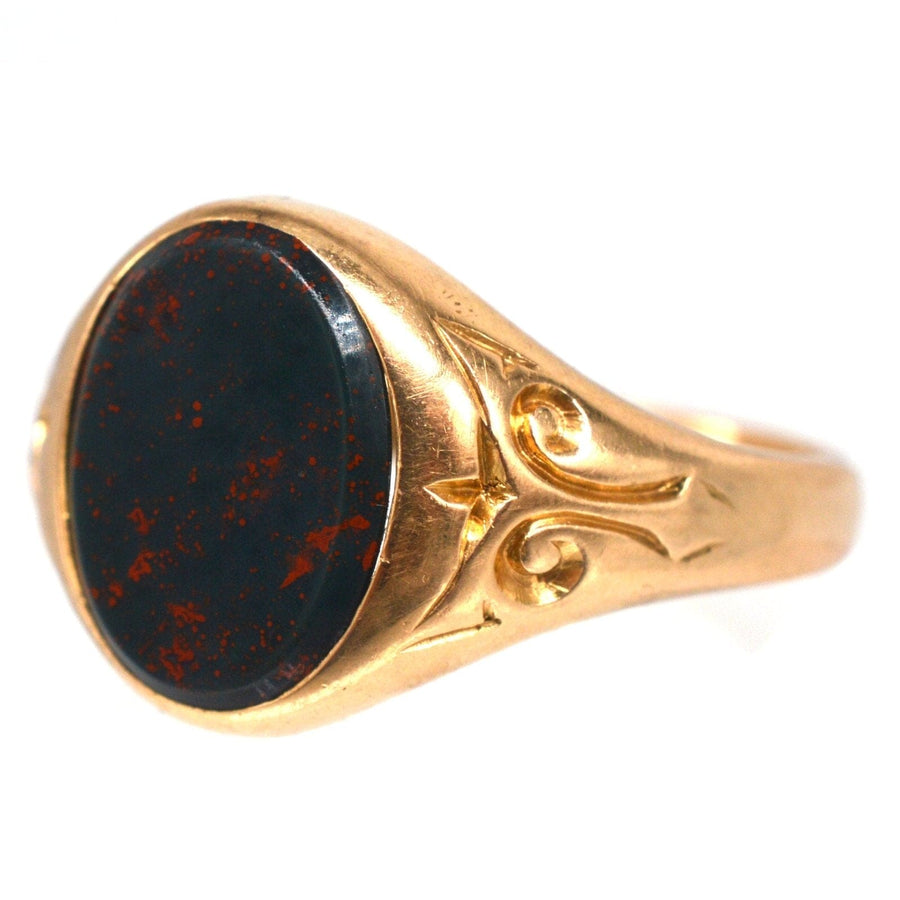 Edwardian 15ct gold bloodstone signet ring with intricate detailing, ideal for engraving or as a stunning jewelry piece.