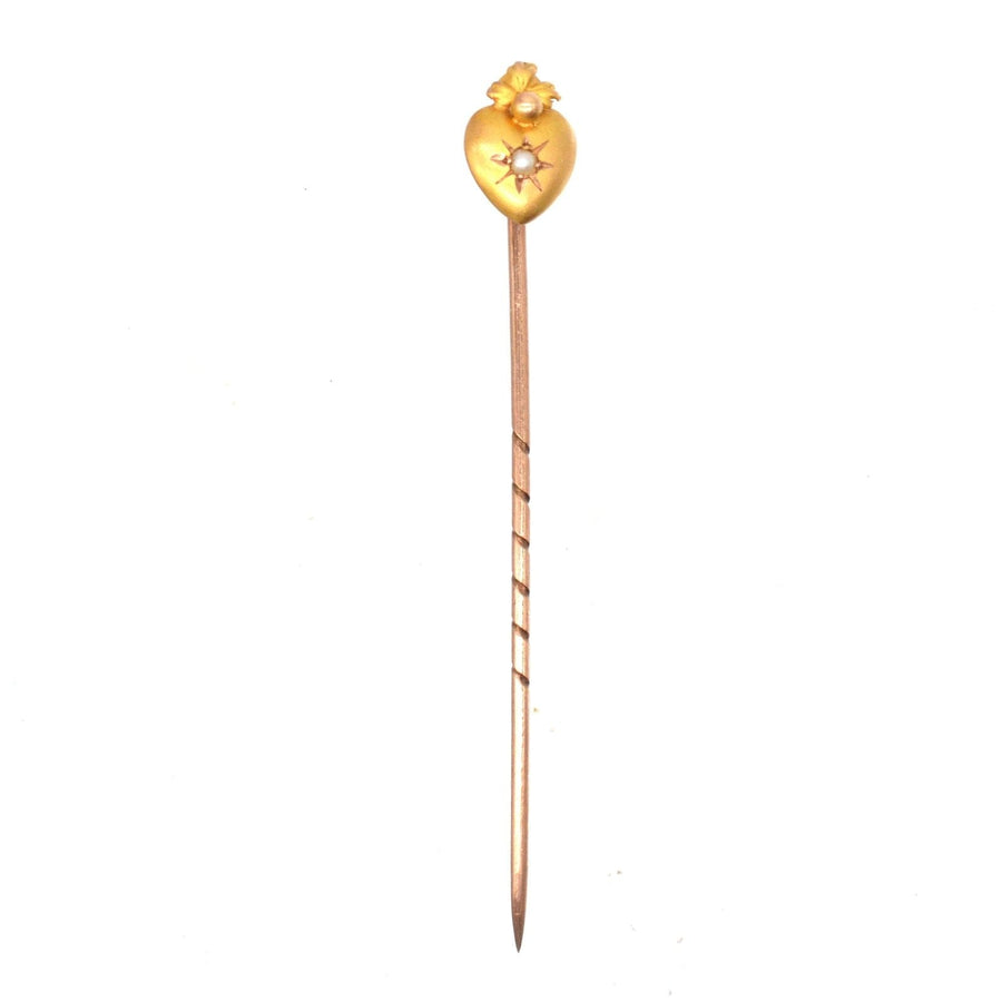 Edwardian 15ct gold burning heart tie pin with pearl, symbolizing love and passion, circa 1900.
