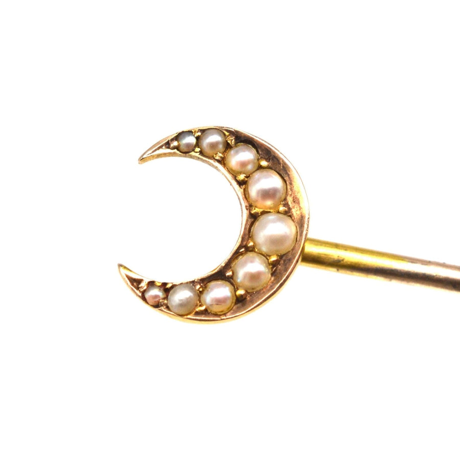 Edwardian 15ct gold crescent moon tie pin adorned with split pearls, designed in a charming Cheshire theme.