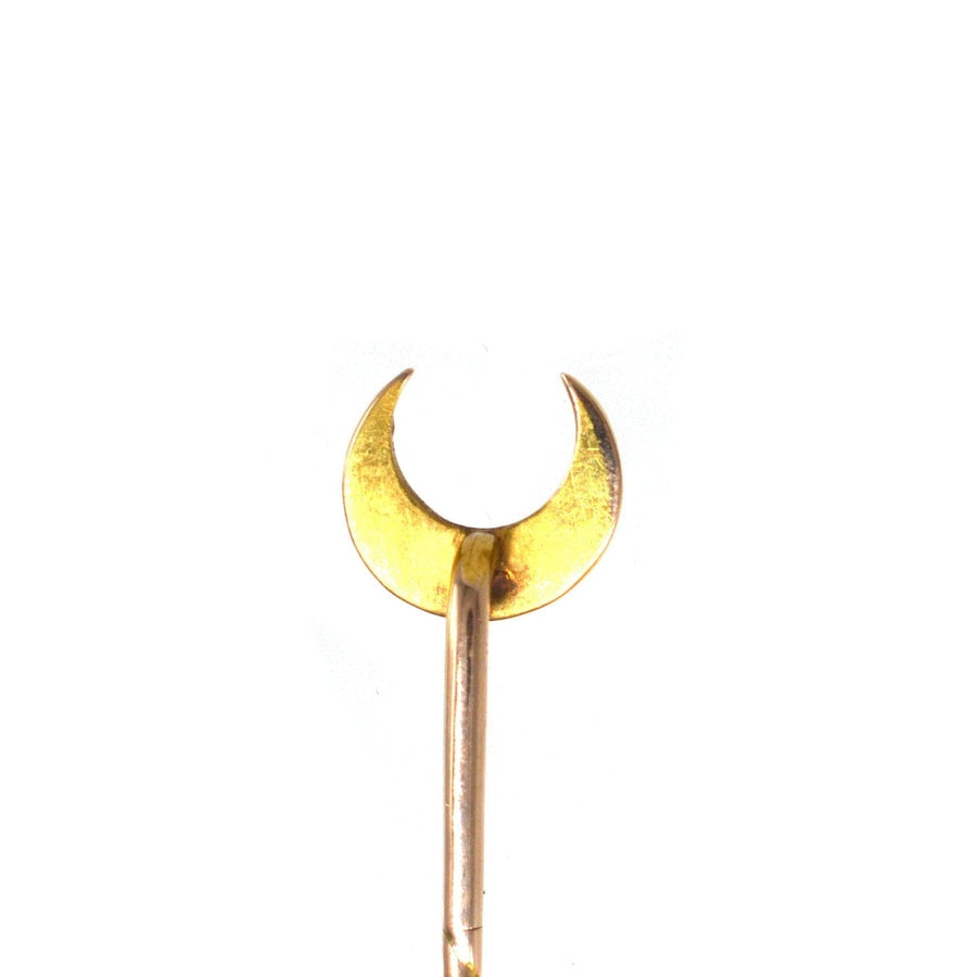 Edwardian 15ct gold Cheshire Moon tie pin featuring a crescent design with split pearls.