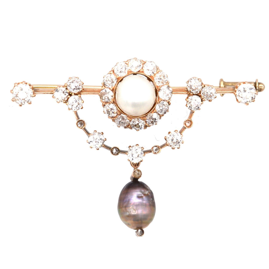 Edwardian 15ct gold bar brooch with diamond cluster and natural black pearl drop.
