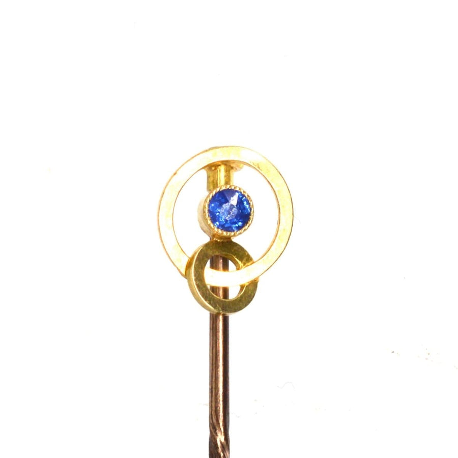 Edwardian 15ct gold double circle tie pin with sapphire, circa 1900-1910, perfect for adding sophistication to any outfit.