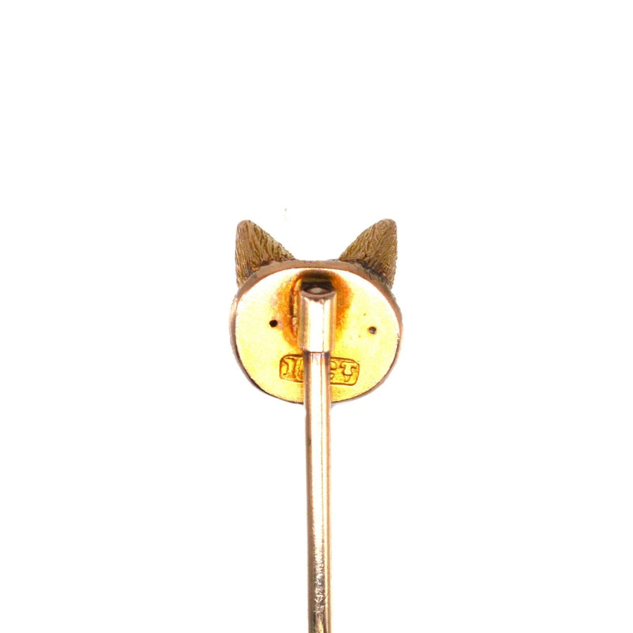 Back view of an Edwardian 15ct gold fox tie pin with garnet red eyes, perfect for silk ties and lapel holes.