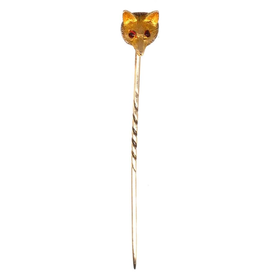 Edwardian 15ct gold fox tie pin with garnet red eyes, perfect for silk ties and lapel buttonholes.
