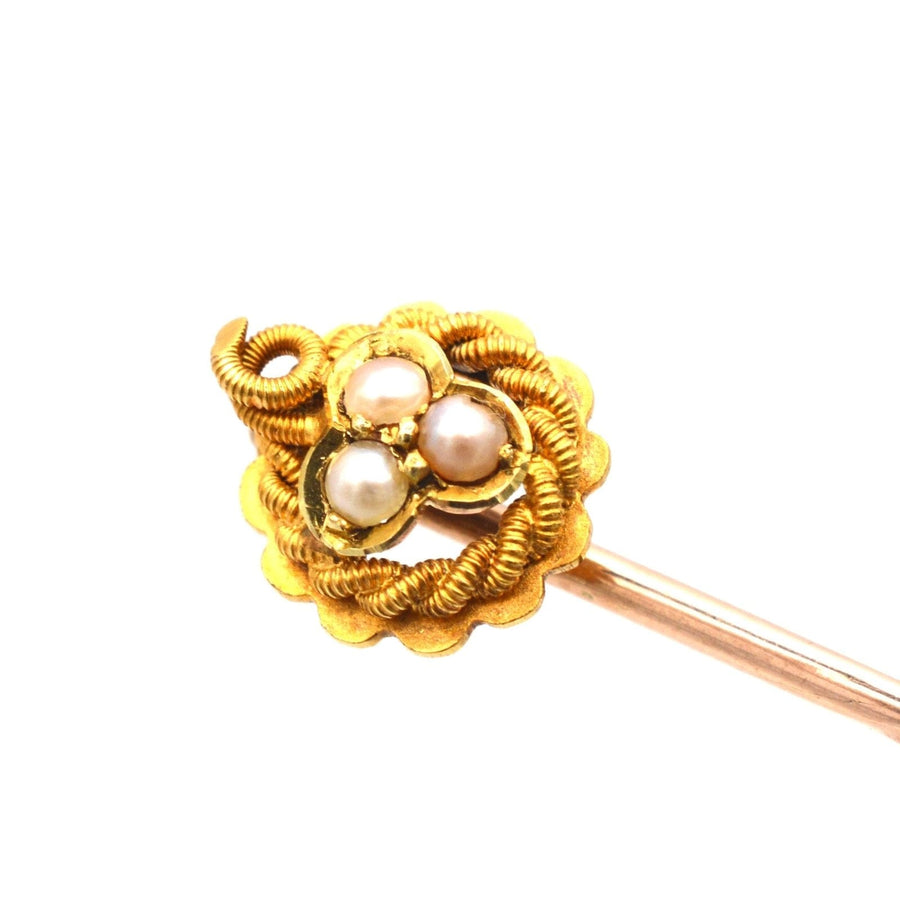 15ct gold tie pin featuring a lucky three leaf clover design with pearl accents, symbolizing faith, hope, and love.
