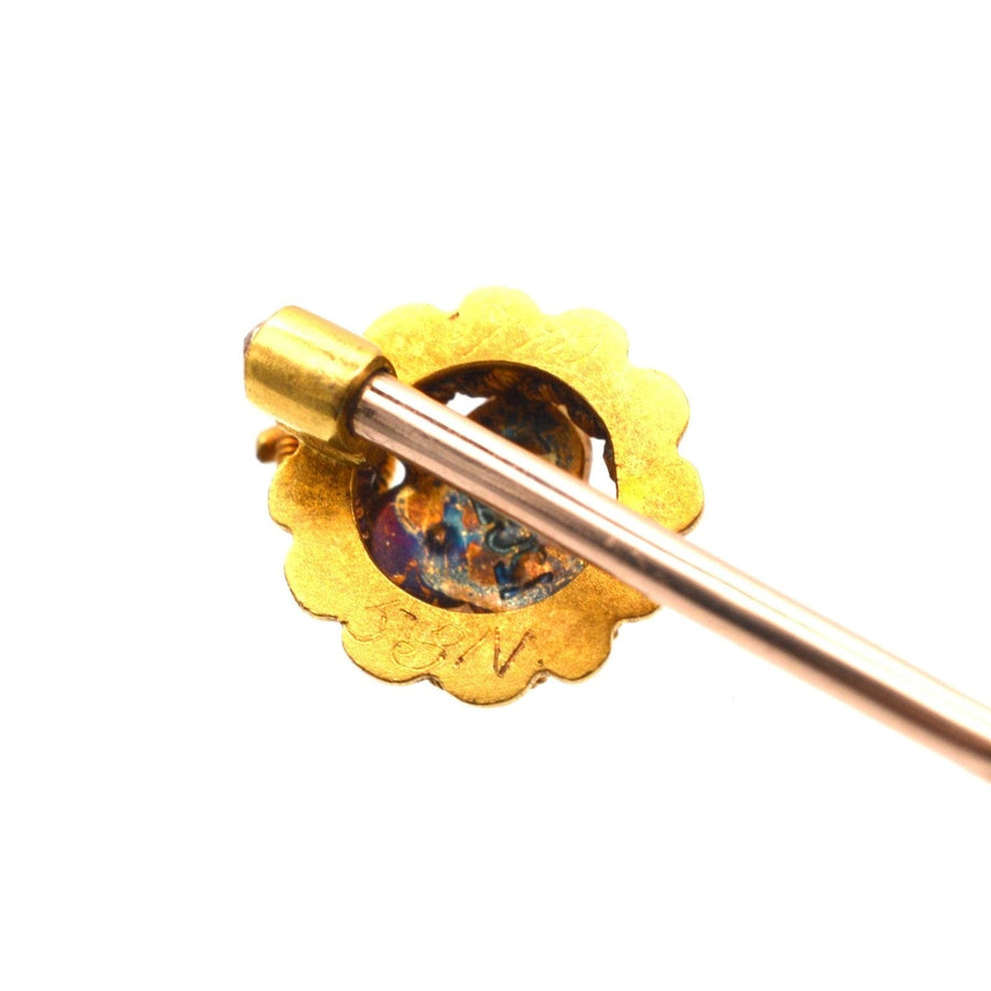 Back view of an Edwardian 15ct gold tie pin featuring a trefoil clover design, showcasing intricately detailed craftsmanship.