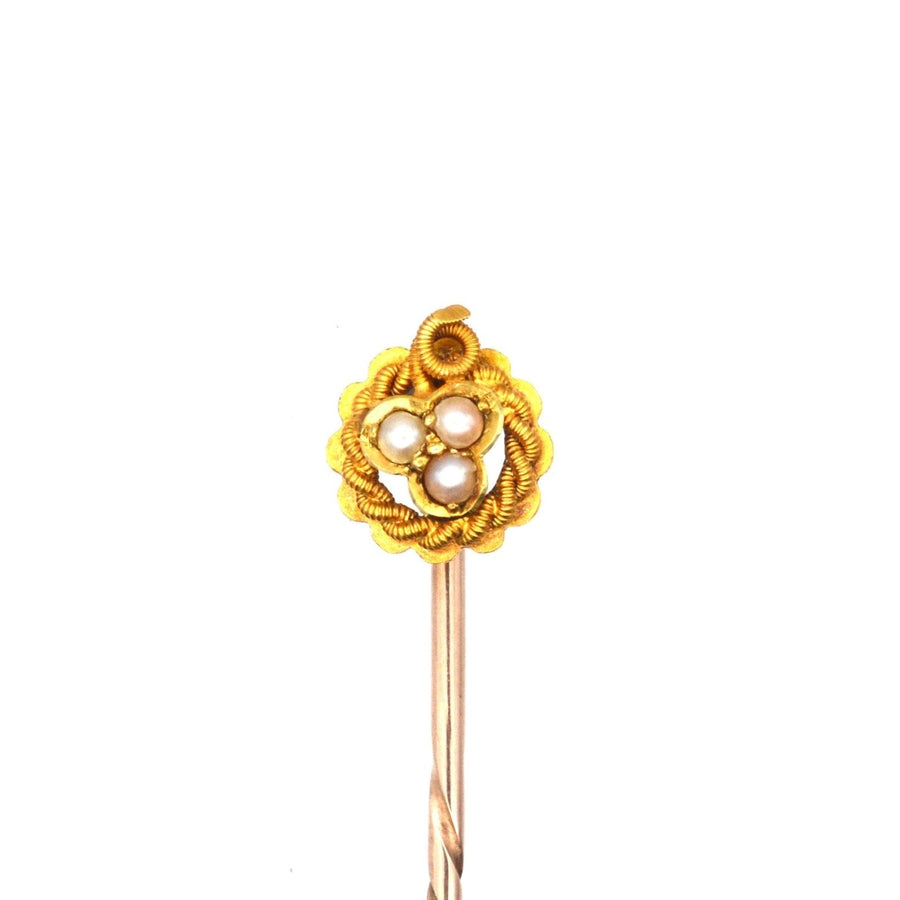 15ct gold clover tie pin featuring three pearls, symbolizing faith, hope, and love, with intricate rope detailing.