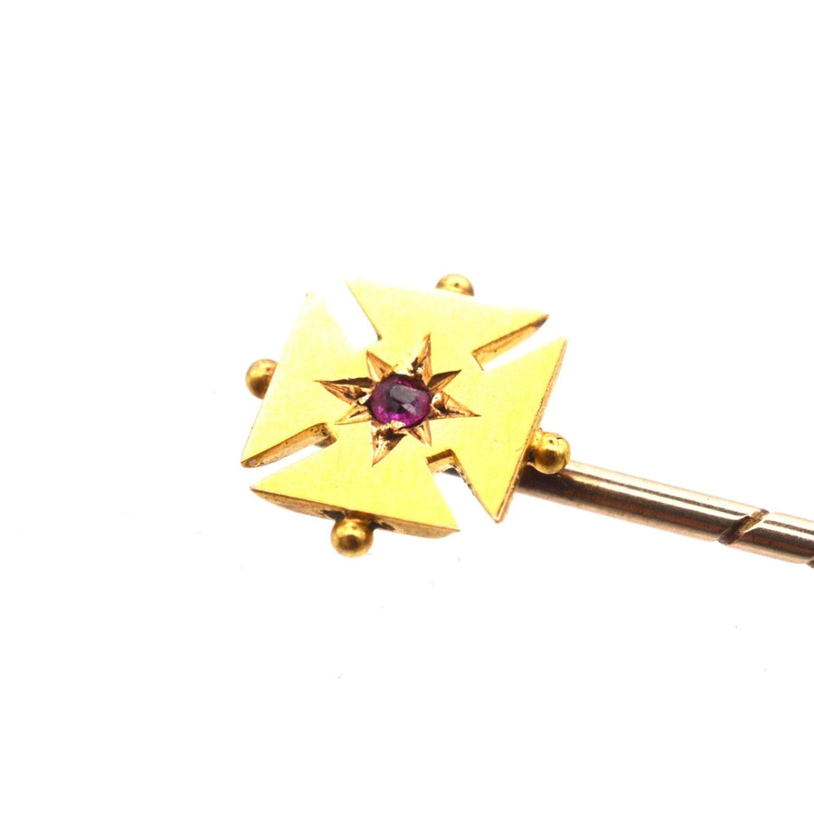 15ct gold Maltese cross tie pin featuring a central ruby, elegant design ideal for silk ties.