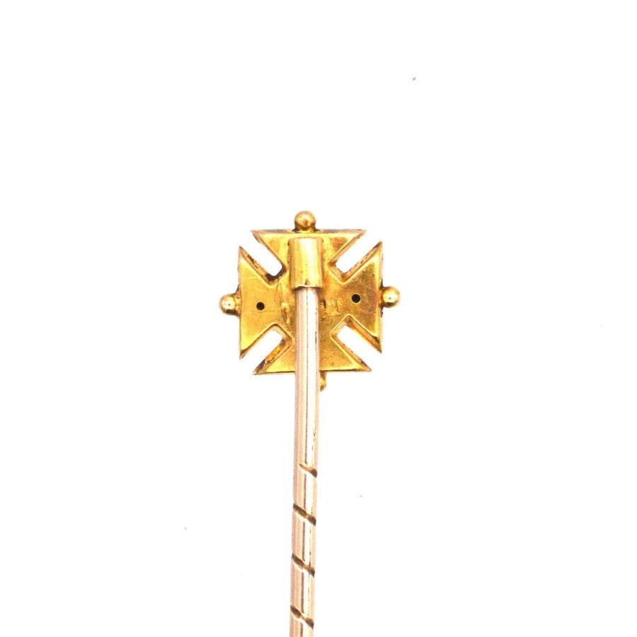 Edwardian 15ct gold Maltese cross tie pin with ruby, featuring detailed design and elegant stickpin style.