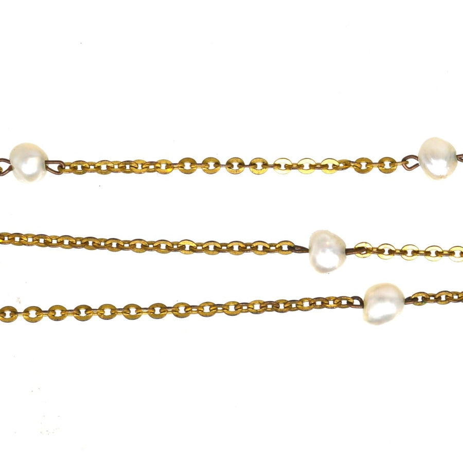 15ct Edwardian gold necklace with natural pearls, showcasing timeless elegance and vintage charm.