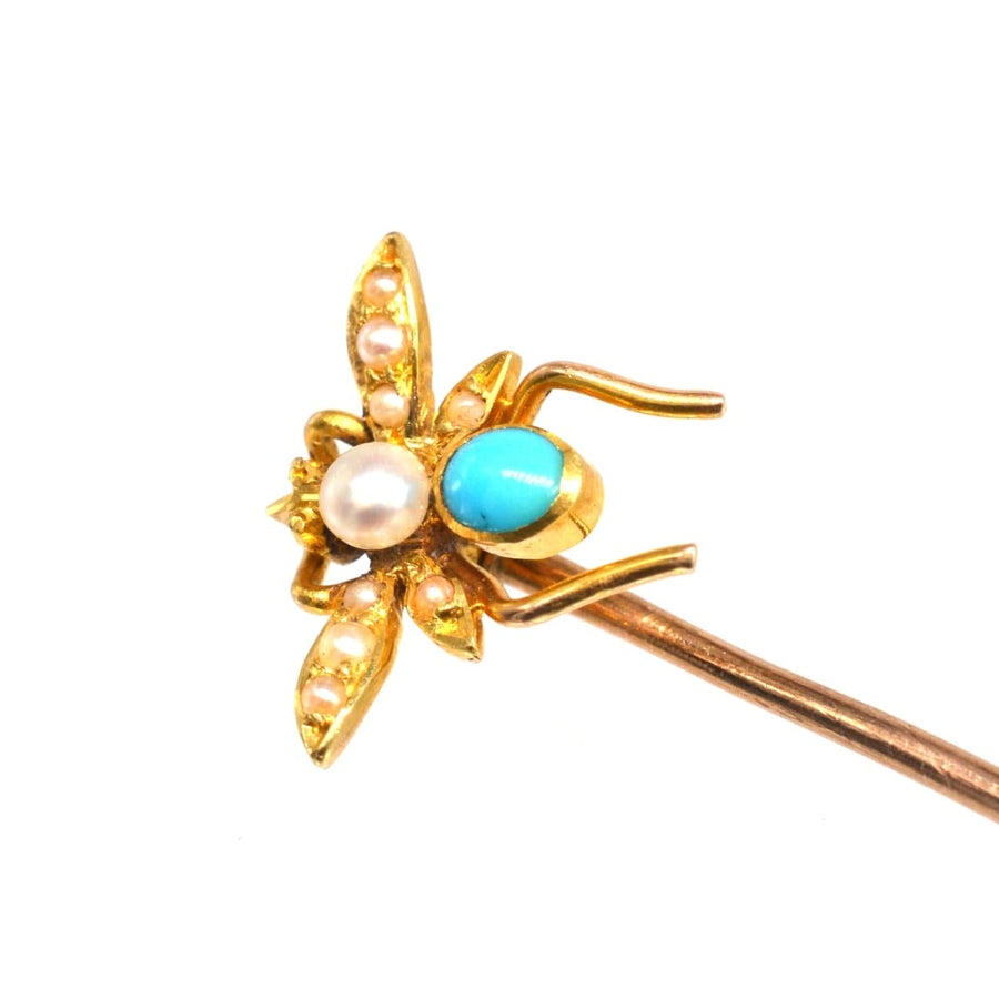 Edwardian gold bug tie pin featuring pearl and turquoise body with pearl wings, perfect for elegant silk ties.