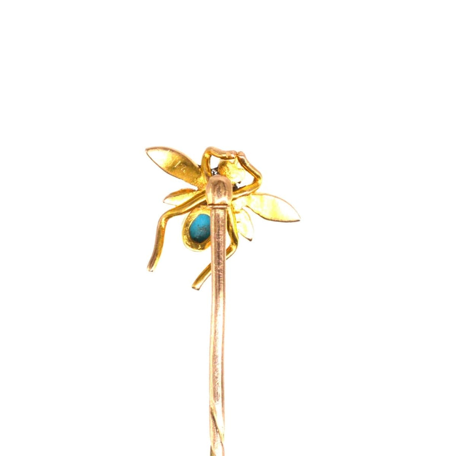 Edwardian 15ct gold bug tie pin with pearl and turquoise accents, perfect for adding a vintage touch to any silk tie.