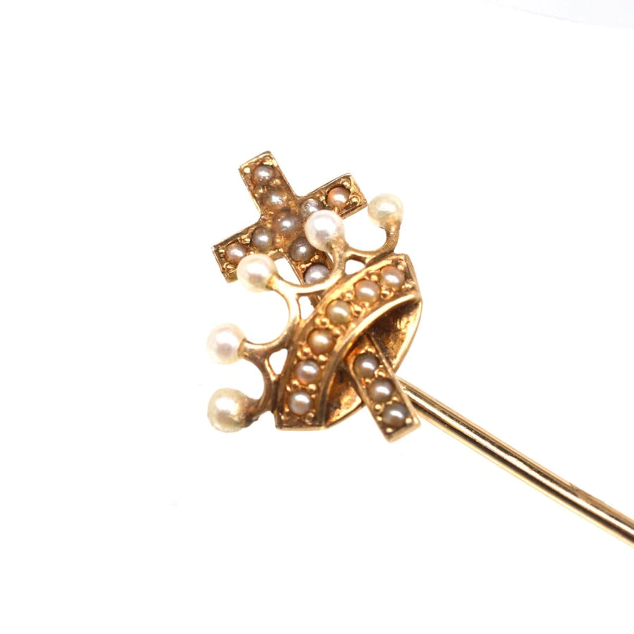 15ct gold tie pin with cross and crown design, adorned with seed pearls, symbolizing Christian heritage.