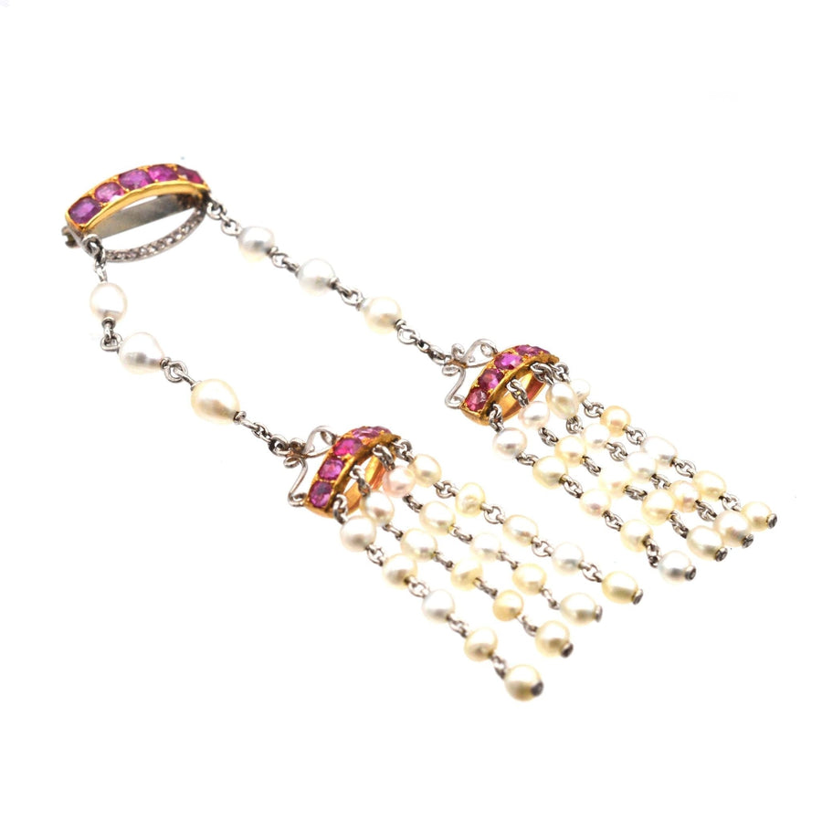 Edwardian 18ct gold and platinum brooch with Burma rubies, natural pearls, and rose diamonds.