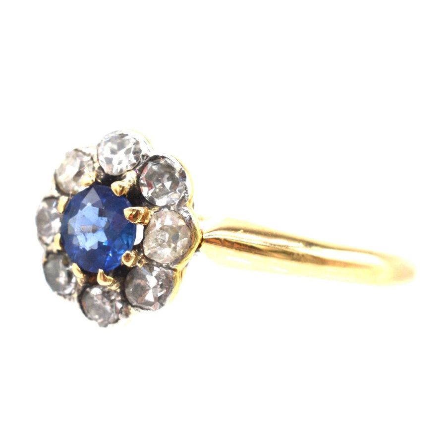 Edwardian 18ct gold cluster ring featuring Ceylon sapphire and diamonds, circa 1910, perfect for engagement.