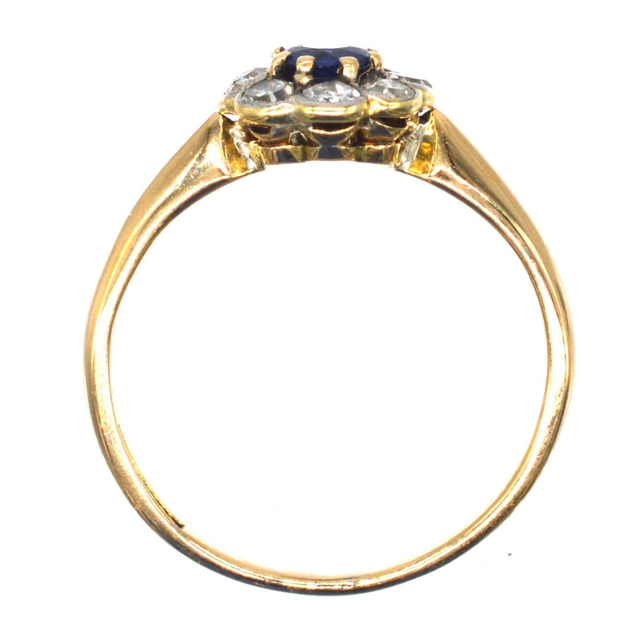 Edwardian 18ct gold and platinum sapphire diamond cluster ring, featuring a stunning Ceylon sapphire and sparkling diamonds.