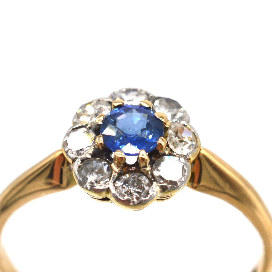 Edwardian 18ct gold and platinum cluster ring featuring Ceylon sapphire and diamond stones, circa 1910