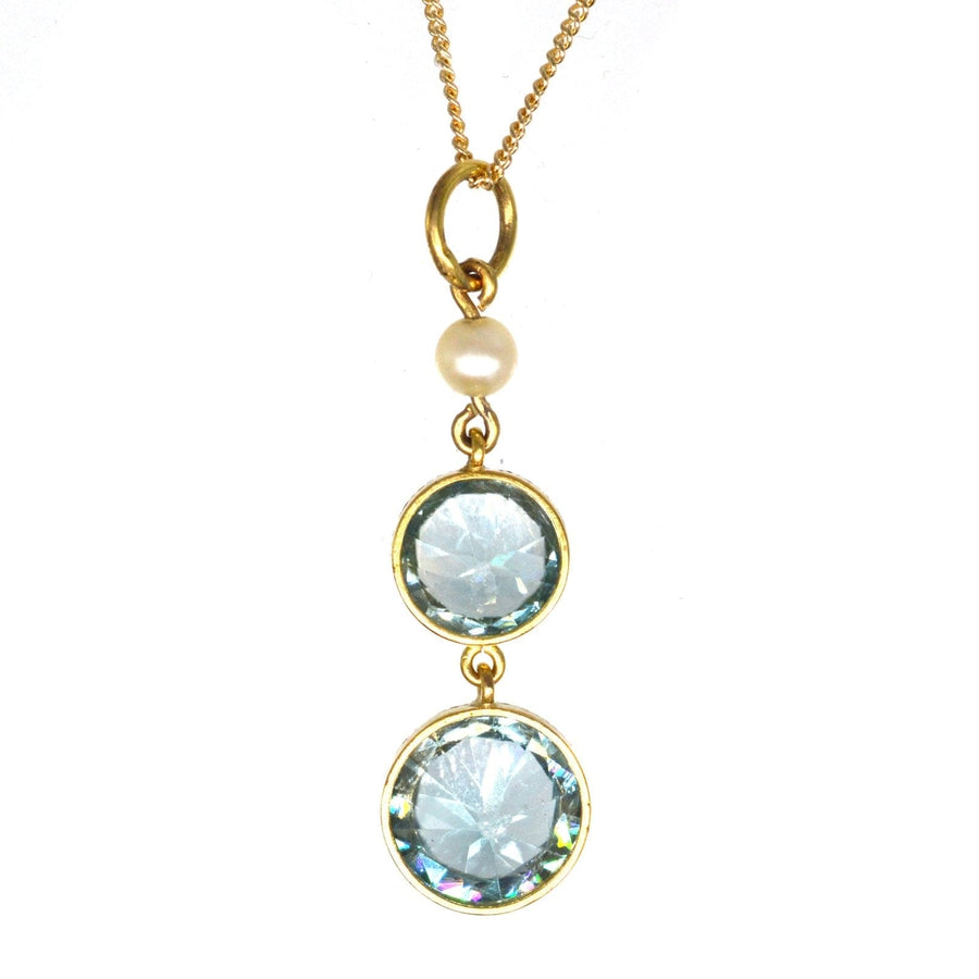Edwardian 18ct gold drop pendant featuring blue zircons and natural pearl on 9ct gold chain.