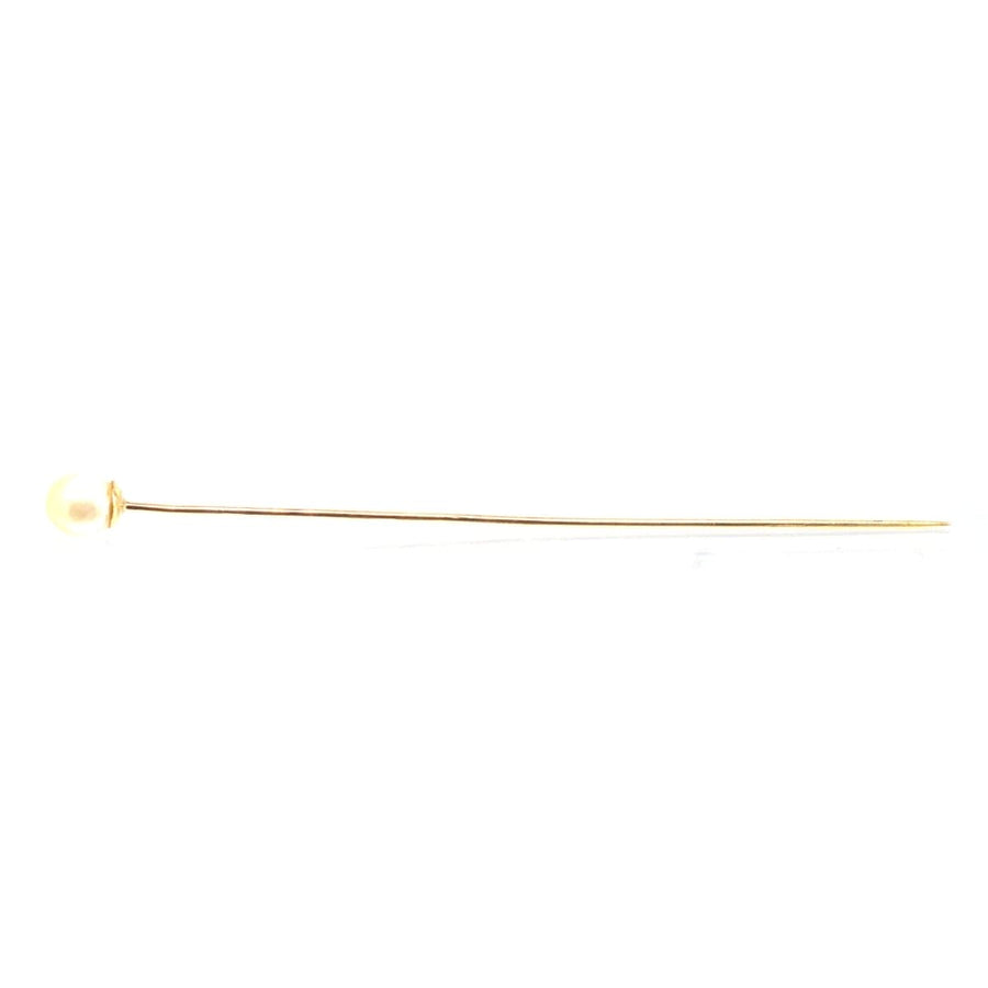 Edwardian 18ct gold natural saltwater pearl tie pin, showcasing a rare pearl atop a sleek gold pin.