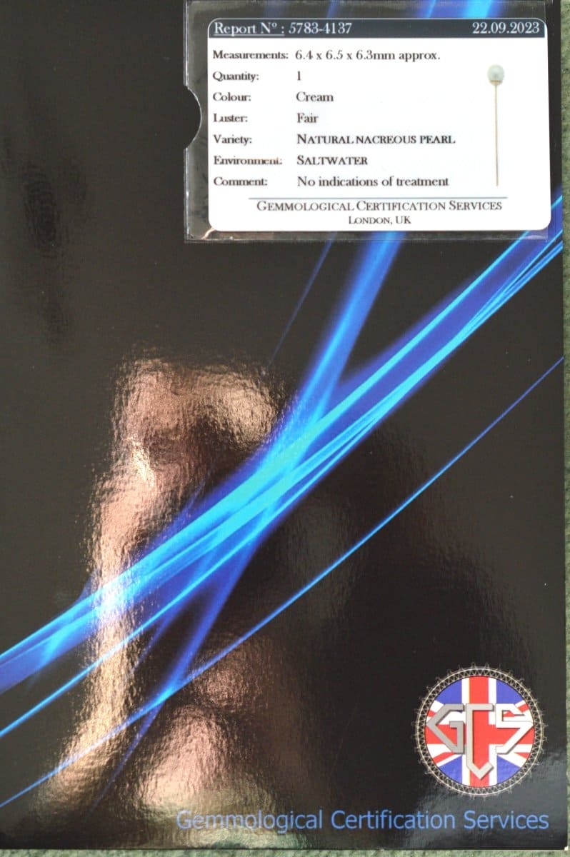 Gemmology certification report for a natural cream saltwater pearl, detailing measurements and treatment status.