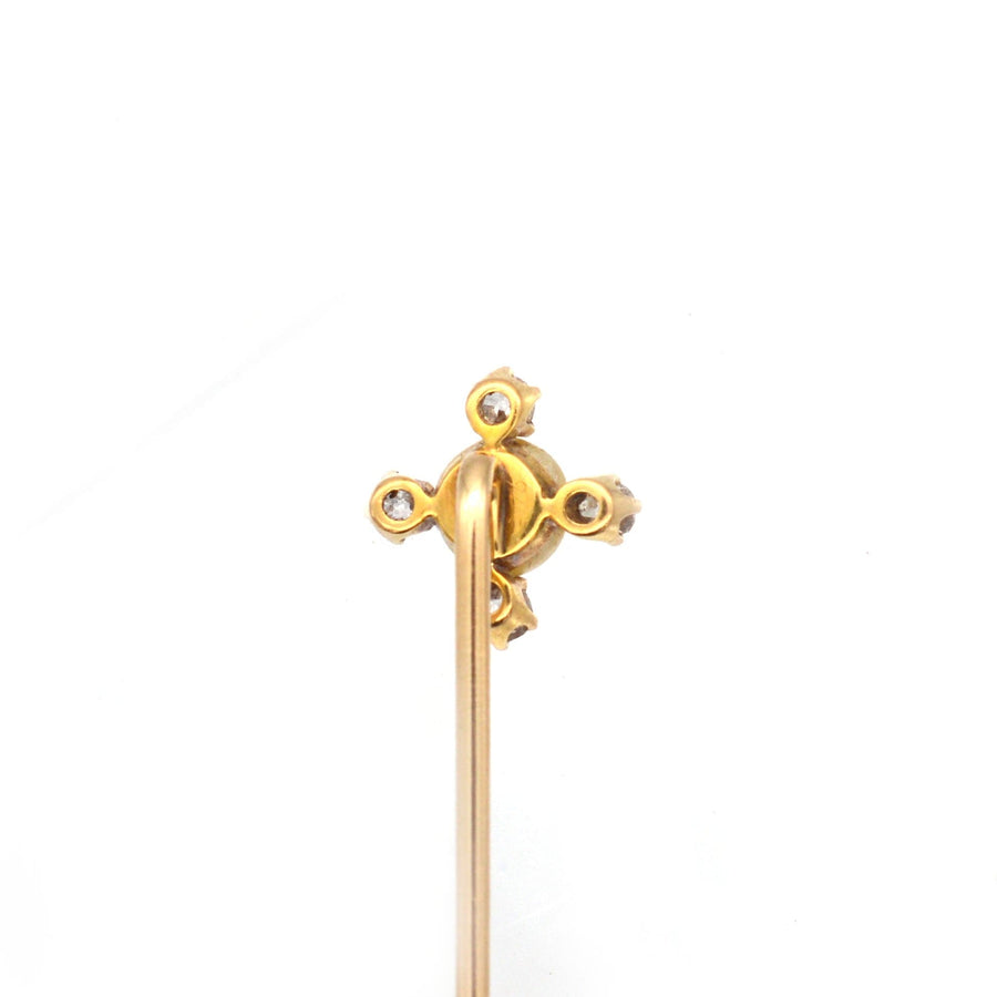 Edwardian 18ct gold tie pin featuring a natural pearl and four diamonds, perfect for ties or lapels.