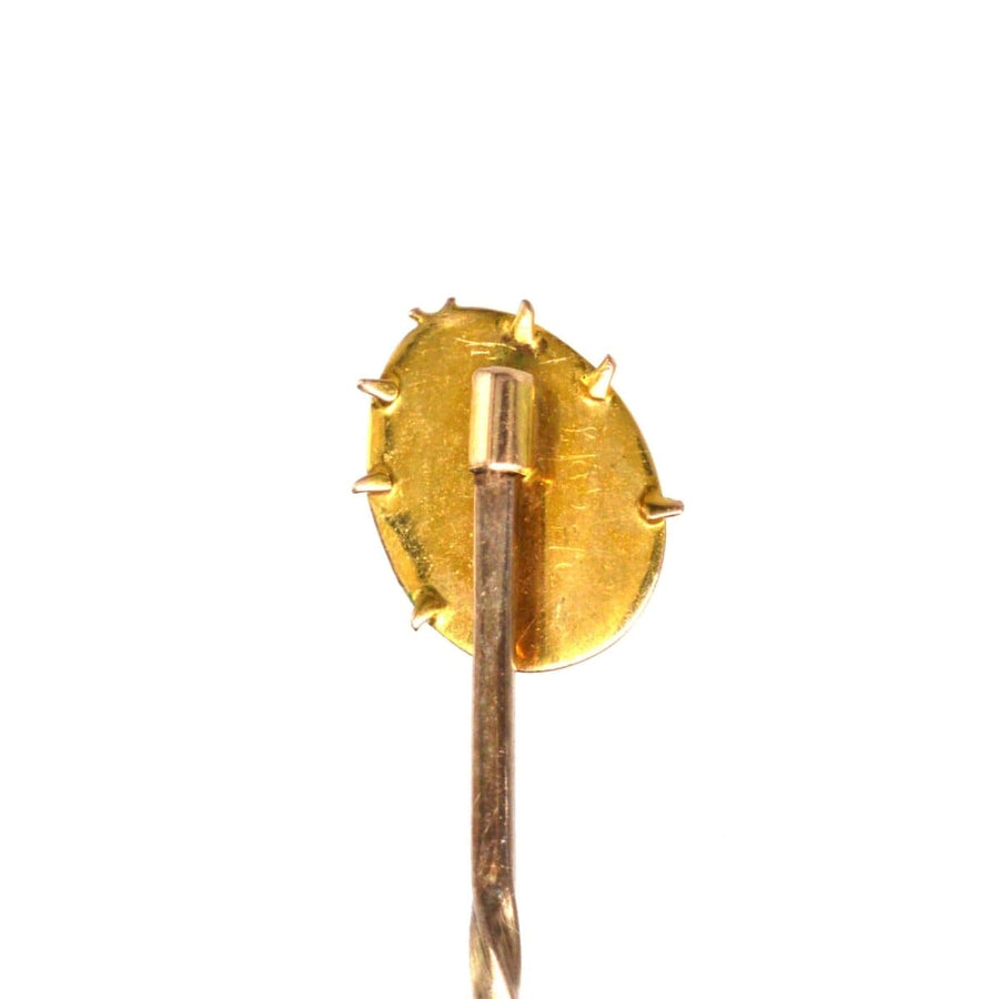 Back view of an Edwardian 18ct gold ladybird tie pin showcasing its intricate design and craftsmanship.