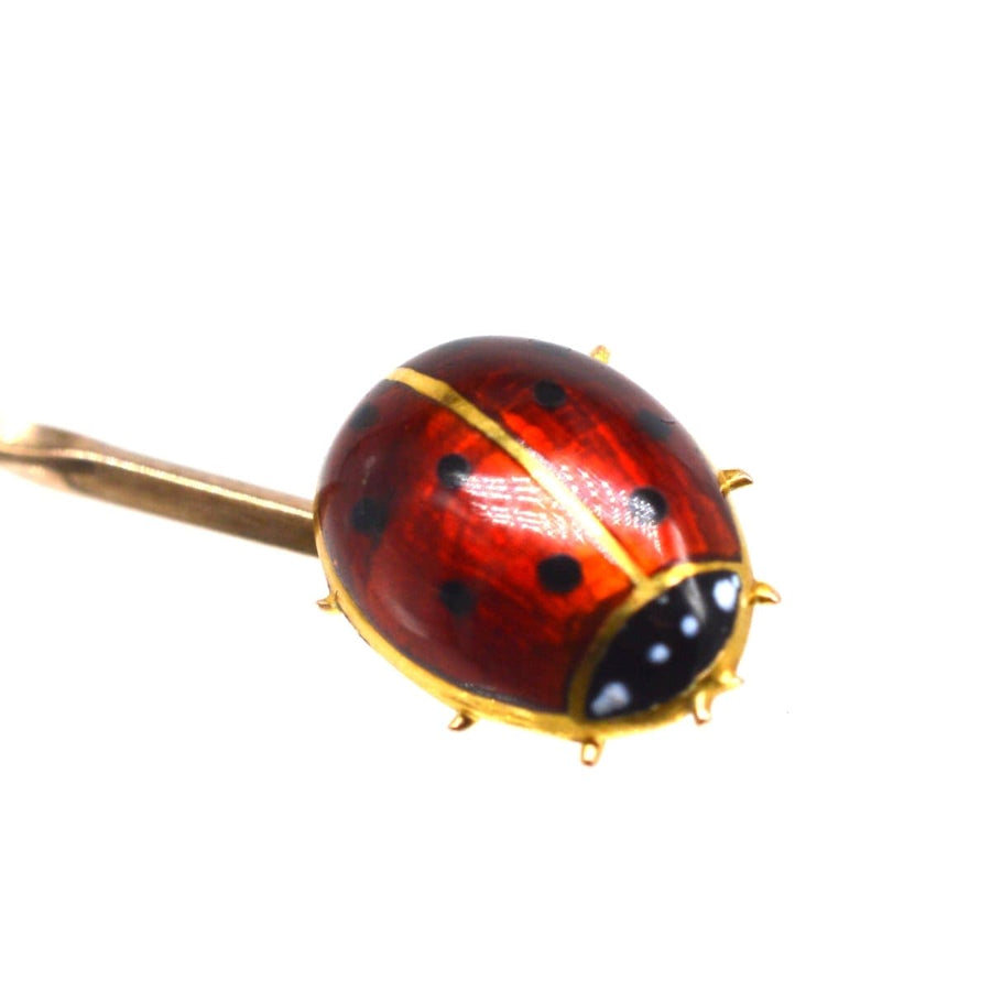 Elegant 18ct gold and enamel ladybird bug tie pin, a symbol of good luck for special occasions.