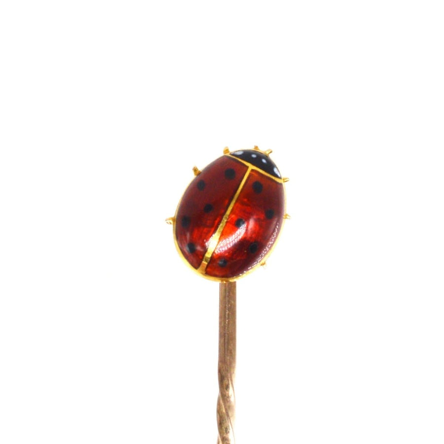 18ct gold and enamel ladybird bug tie pin, a charming accessory symbolizing good luck and new beginnings.