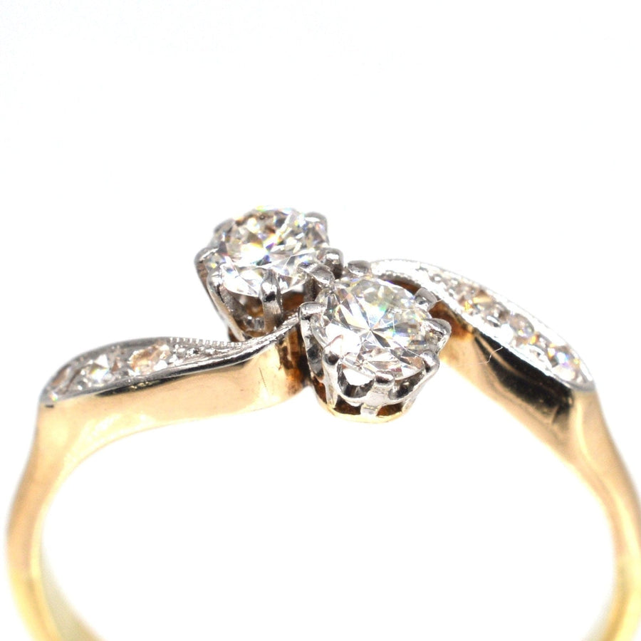 Edwardian 18ct gold and platinum two stone diamond crossover ring, ideal romantic engagement ring.