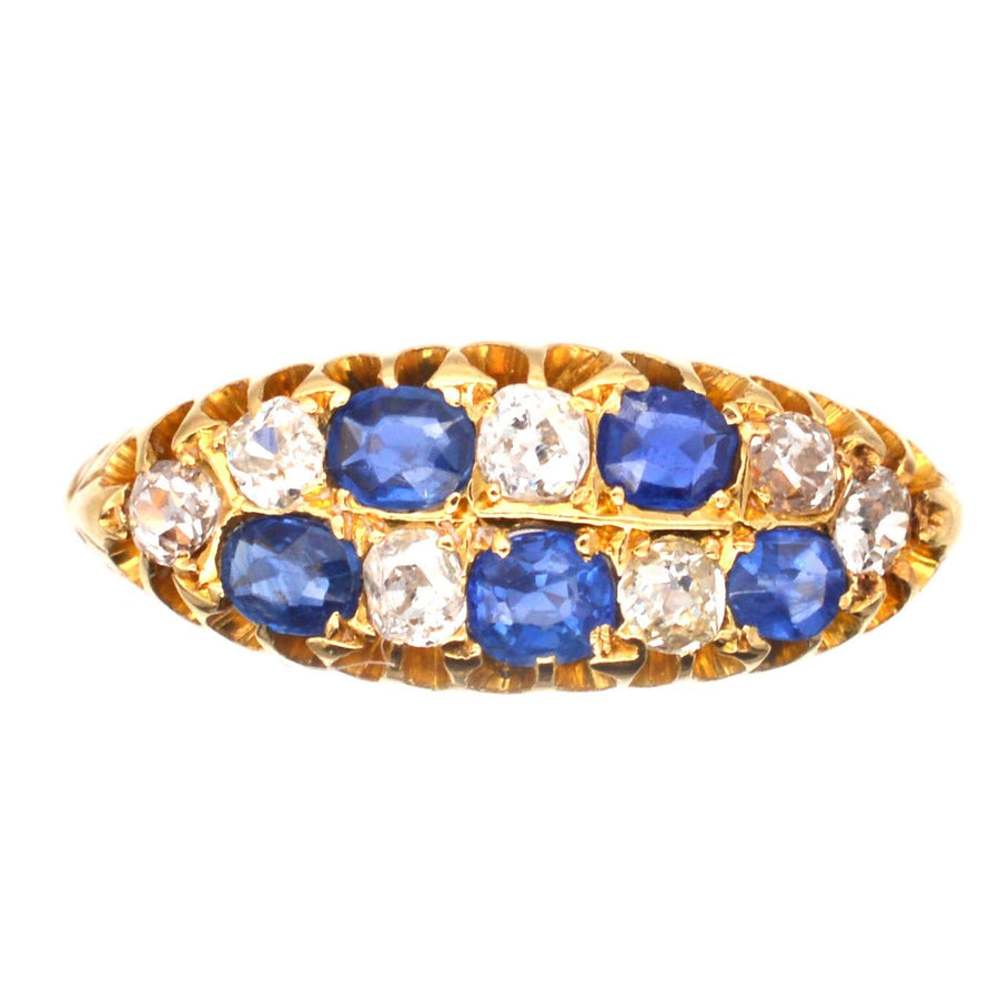 Edwardian chequerboard ring featuring sapphires and old mine cut diamonds set in 18ct gold from 1903.