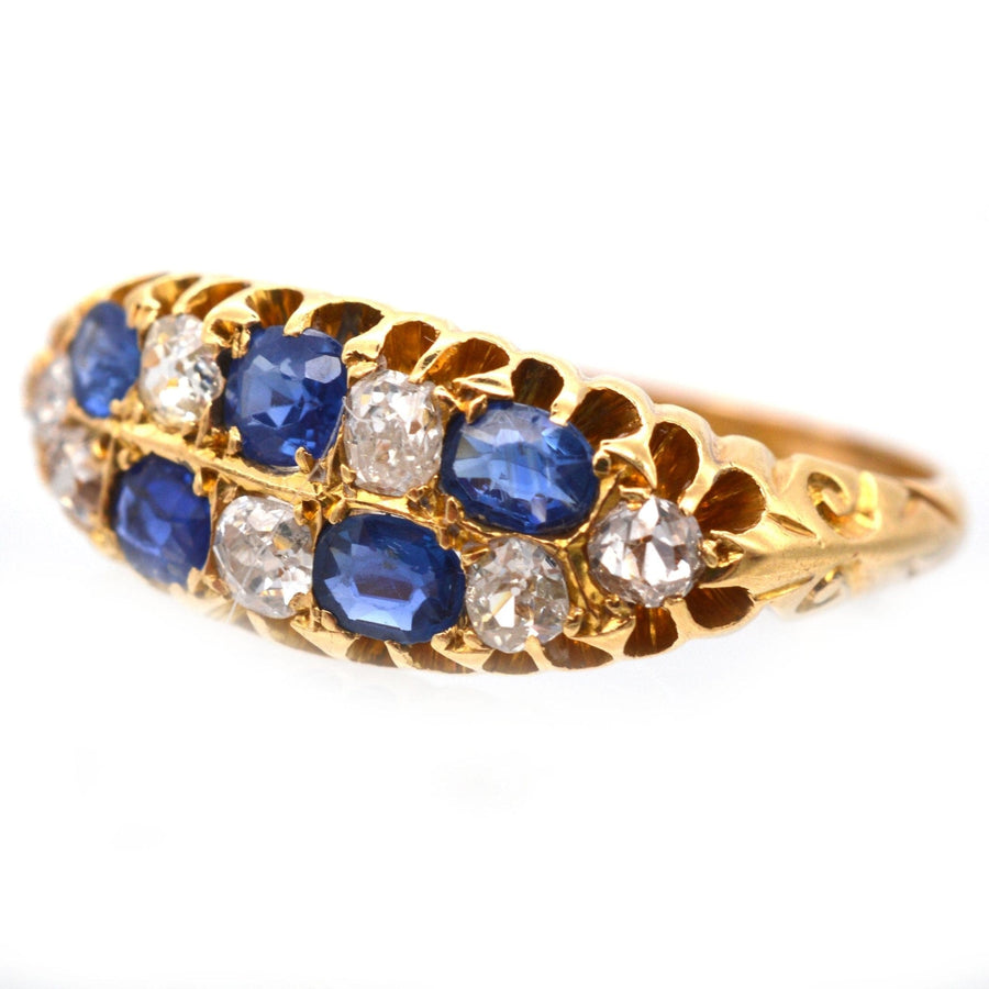 Edwardian 18ct gold ring with sapphires and old mine cut diamonds, quirky chequerboard design from 1903.