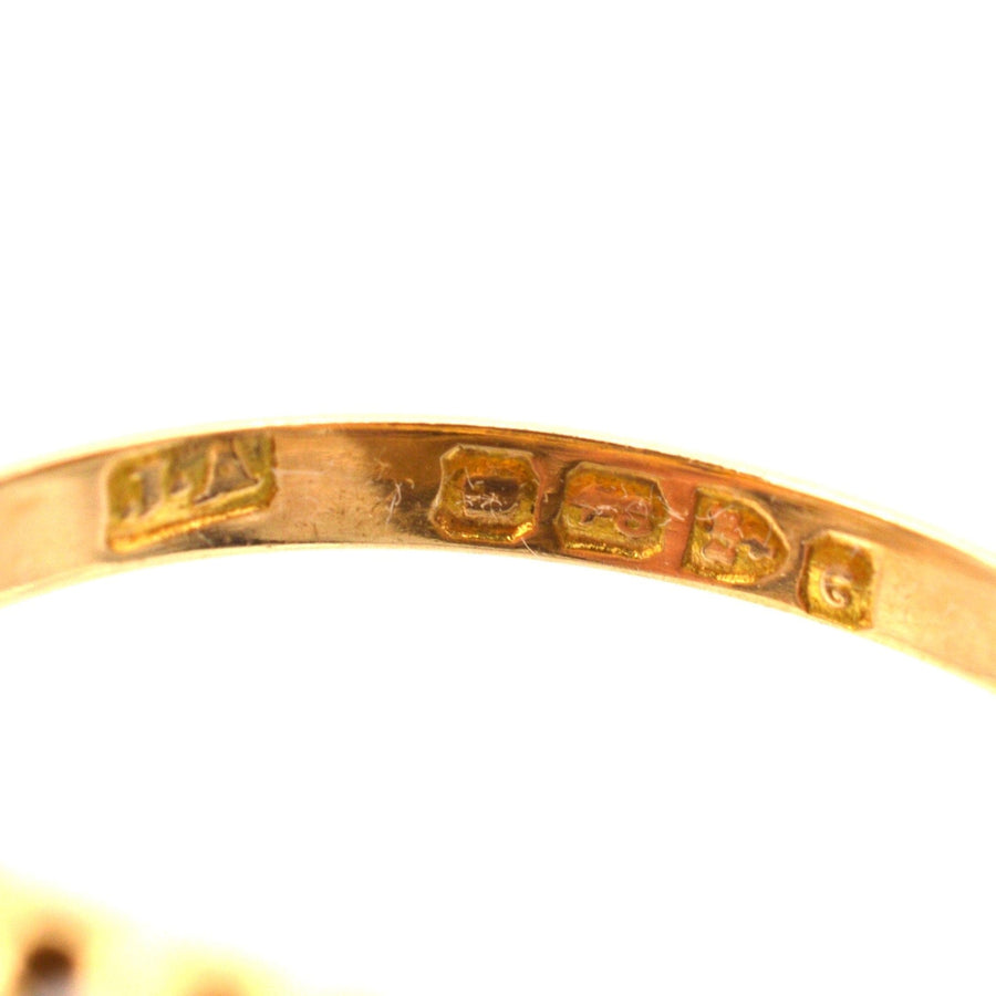 Edwardian 18ct gold ring hallmarks, showcasing authenticity and craftsmanship from 1903.