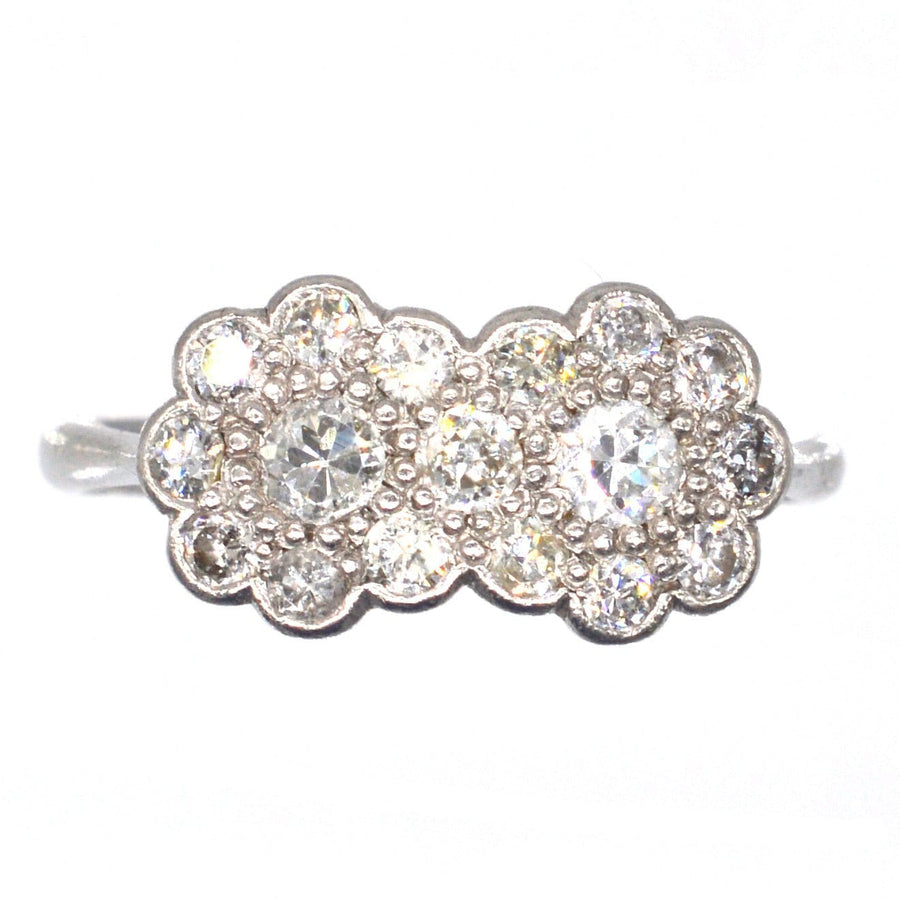 Edwardian 18ct white gold and platinum double cluster diamond ring, featuring stunning sparkly diamonds.