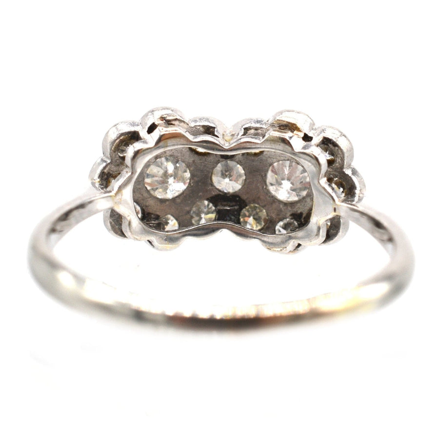 Edwardian 18ct white gold and platinum double cluster diamond ring with sparkling diamonds.