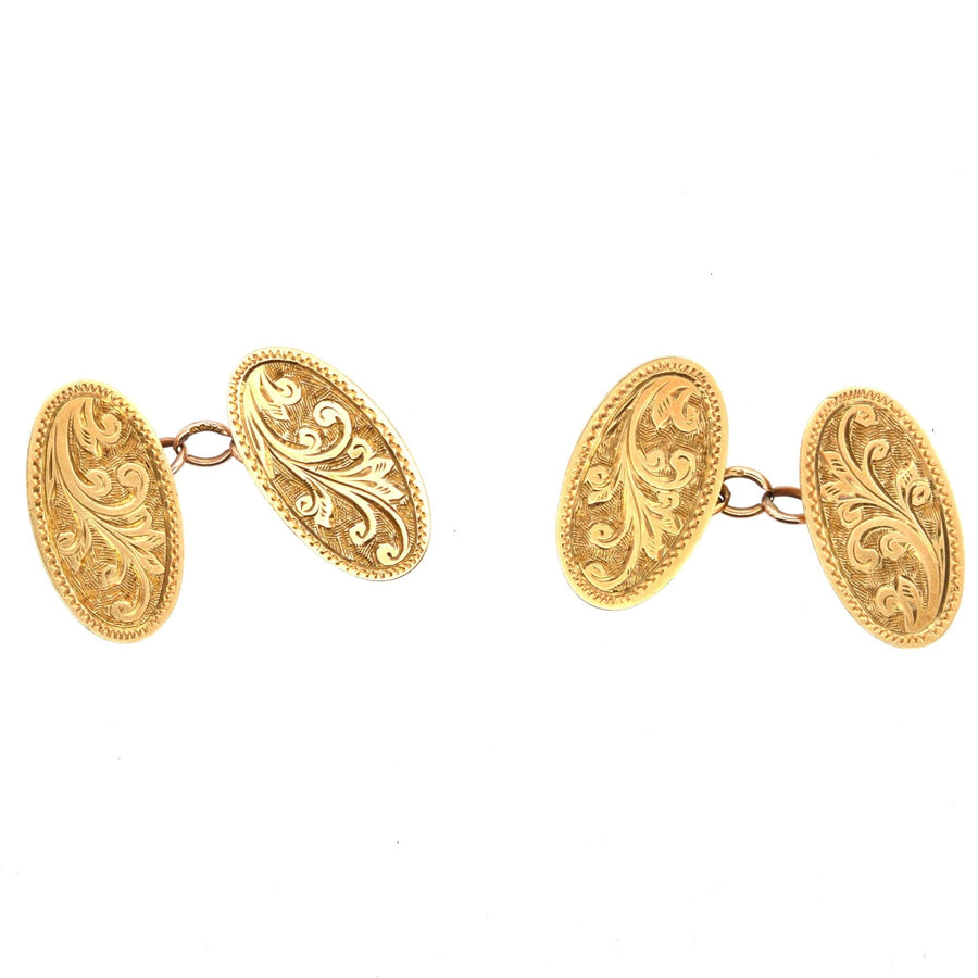 Edwardian 9ct gold cufflinks with intricate foliage design, perfect for a classic formal look.