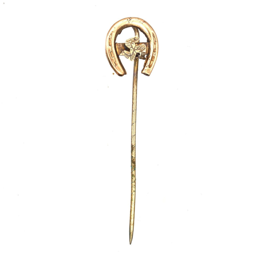 Edwardian 9ct gold lucky horseshoe tie pin with Isle of Man Triskelion design, symbolizing good luck.